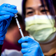 Image for article titled Pros And Cons Of Sharing Vaccine Supplies And Technology